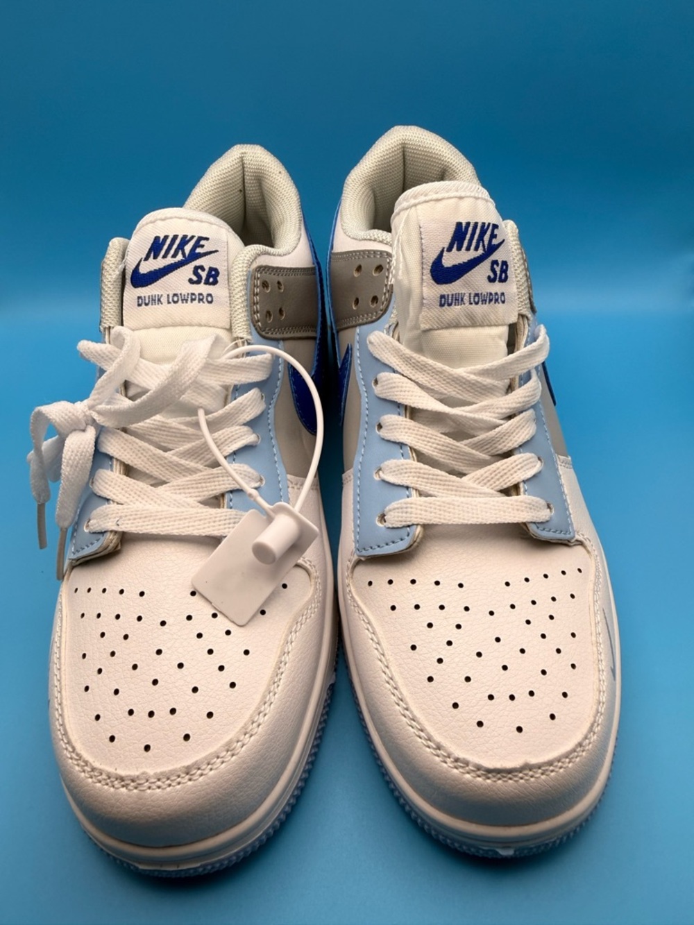 Nike Men’s Low-Top Sneakers — White and Blue